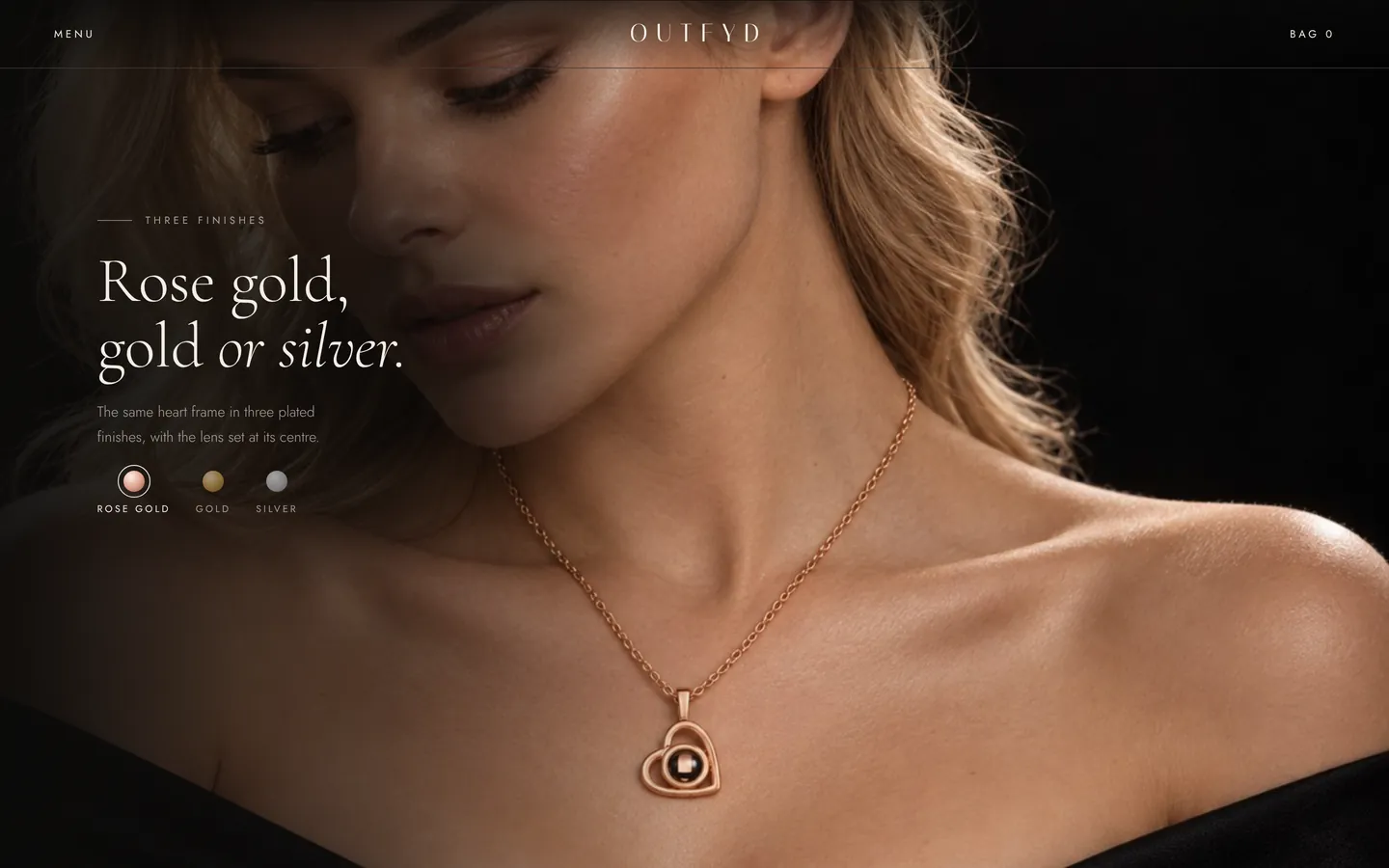 Finishes: the pendant worn by a model