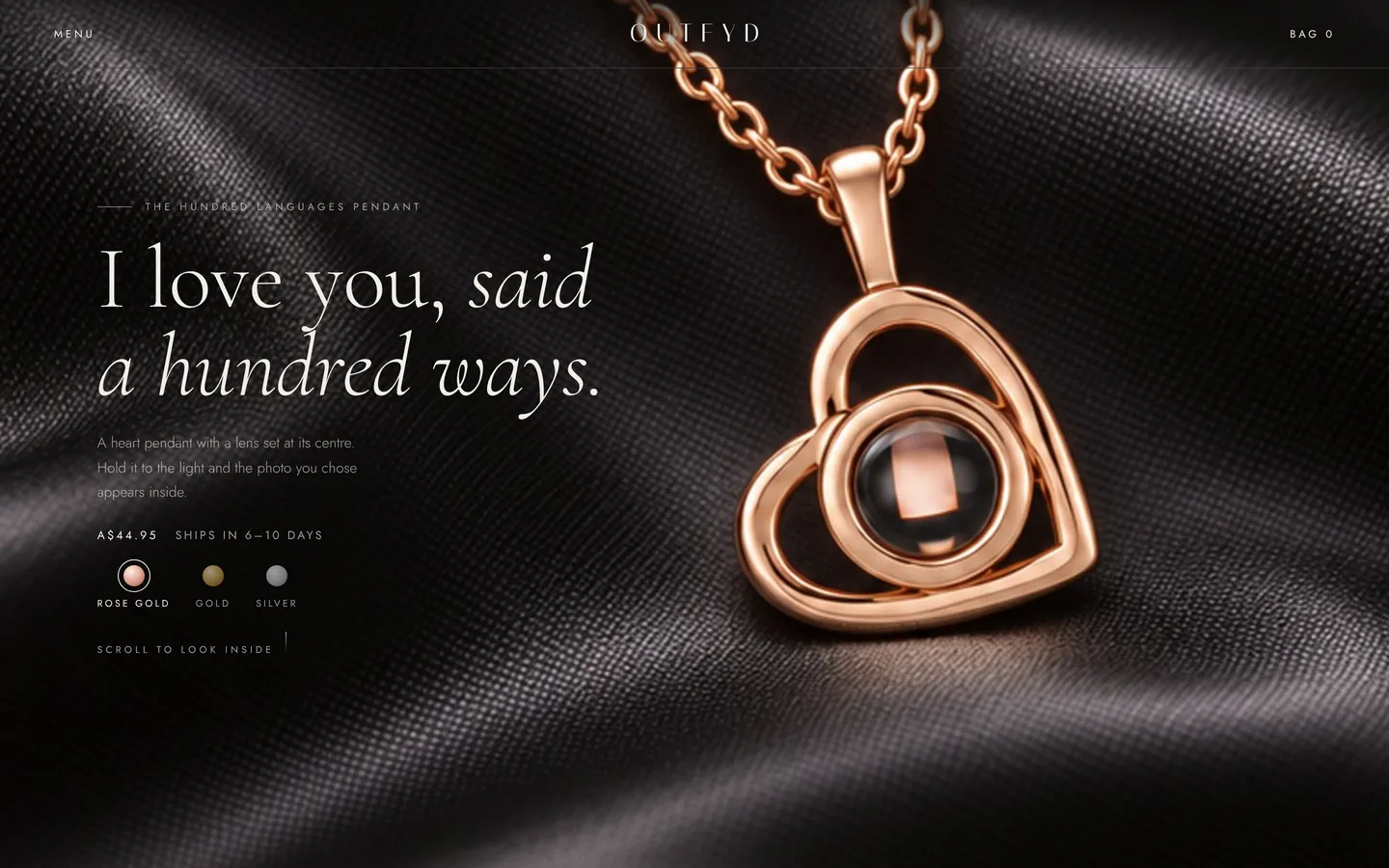 Hero: the pendant on dark satin with the headline I love you, said a hundred ways